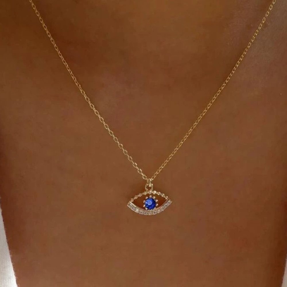 Anthropologie Gold Necklace with Blue Eye Pendant